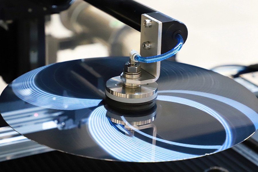 Grinding coolant filtration for optics and semiconductor processing